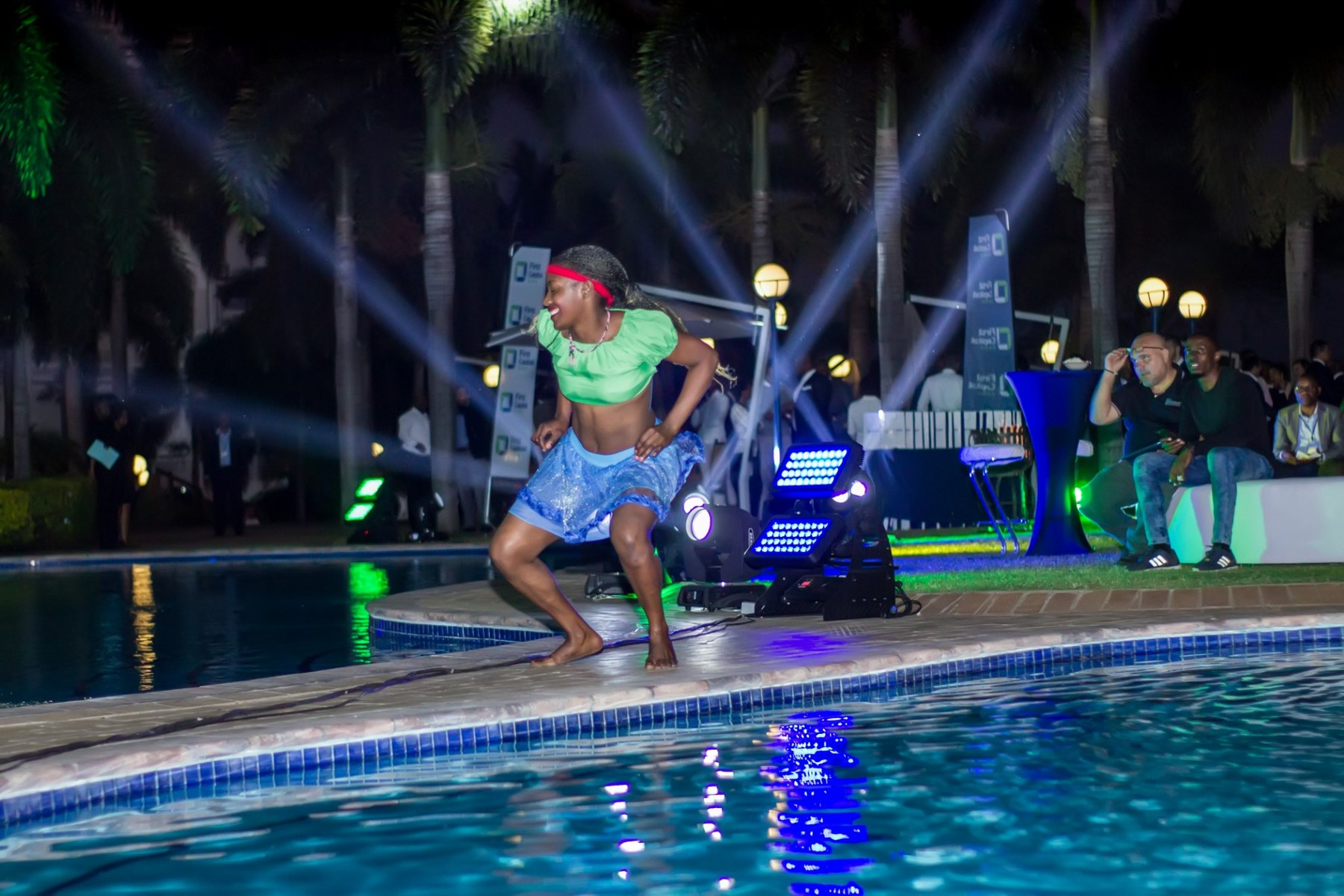 Live poolside entertainment at an Elite Hosting event
