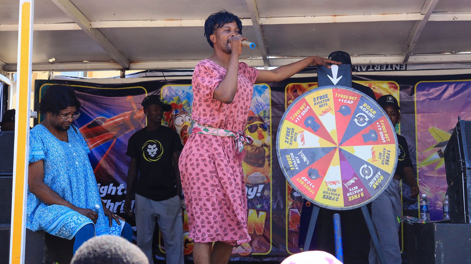 PrideBet live activation featuring a host, branded stage and spin-the-wheel activity